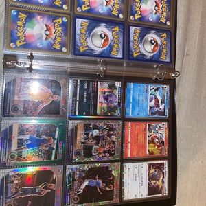 Booklet of Pokémon cards and 5 NBA hoops cards